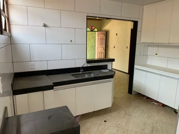 Imagem Casa Linear 3 quartos sendo uma suíte varanda duas vagas de garagem espaço gourmet com churrasqueira na Praia do Morro.