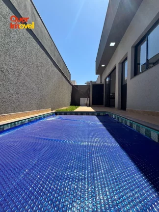 Imagem Casa de alto padrão em condomínio no Jardim Cybelli em Ribeirão Preto-SP! 3 quartos, 3 suítes, 3 salas, 5 banheiros, 4 vagas de garagem e 149,15 m² de área. Quer Imóvel Negócios Imobiliários!