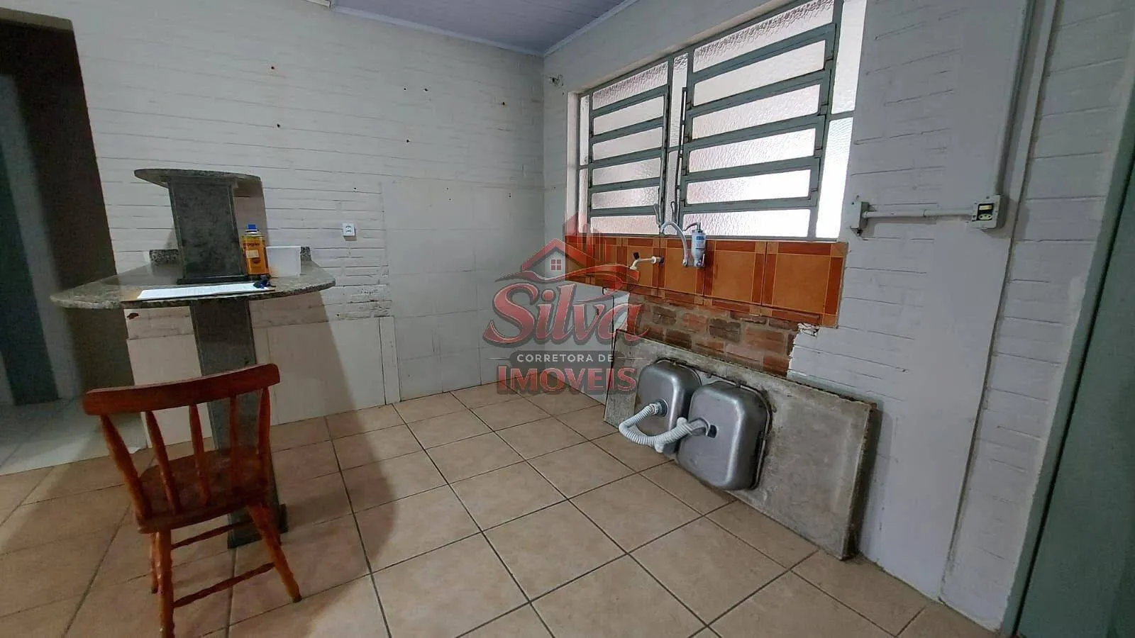 Imagem Casa com suíte à venda em Imbé com lareira e 103m²