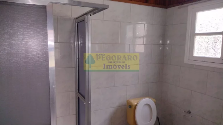 Imagem Imperdível Casa de 4 Quartos na Prainha, Caraguatatuba-SP: 2 Suítes, 2 Salas, 4 Banheiros, 4 Vagas de Garagem!