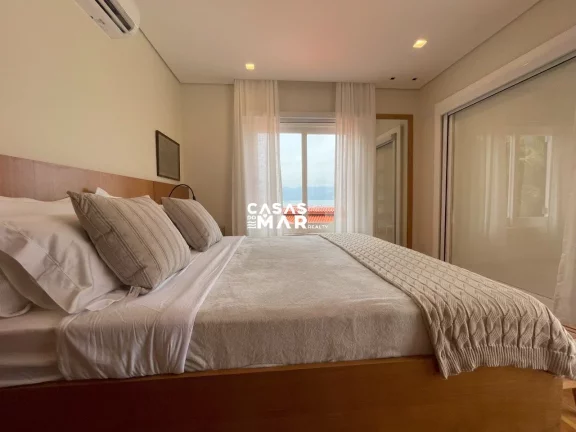 Imagem Casa de Luxo à Beira-Mar em Condomínio na Vila Velha, Angra dos Reis-RJ: 6 Quartos, 6 Suítes, 7 Salas e 7 Banheiros.