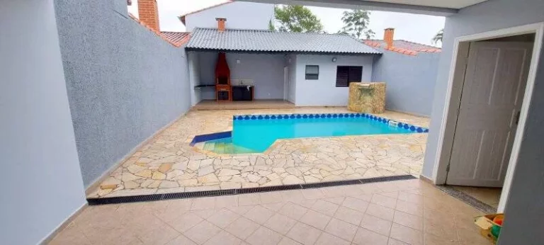 Imagem LINDO SOBRADO LADO PRAIA COM 4 DORMITORIOS (3 SUITES)