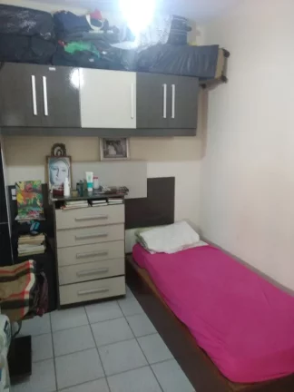 Imagem De frente para o mar da Praia do Morro 3 quartos sendo uma suíte +DCE duas vagas de garagem. Prédio com área de lazer