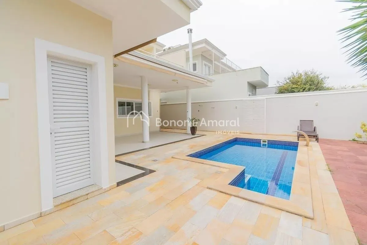 Imagem Casa de condomínio para alugar com 318m², 4 quartos e 4 vagas
