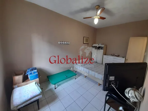 Imagem Casa com 3 dormitórios e 2 vagas à venda no Macuco em Santos R$ 900.000,00
