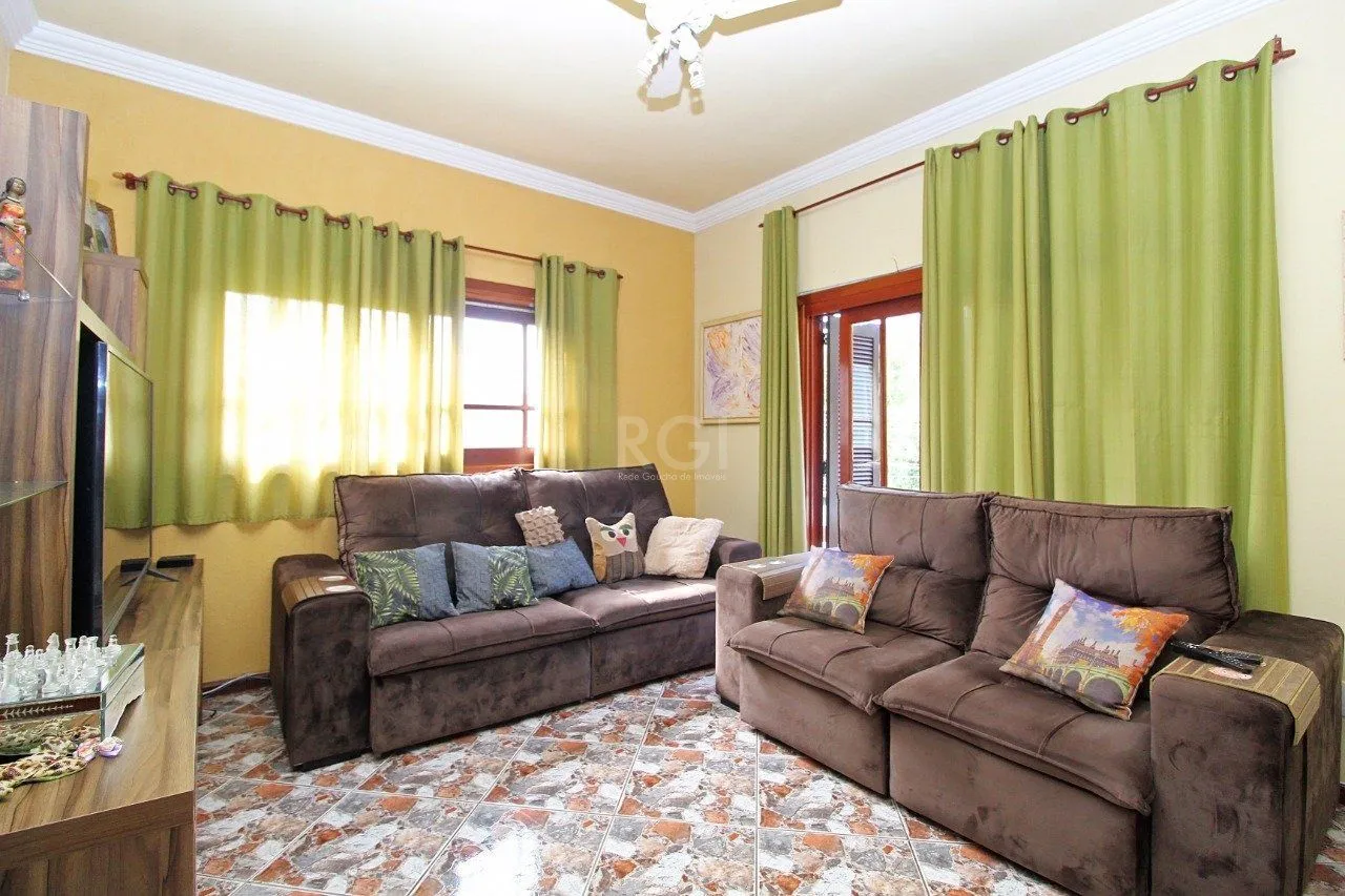 Imagem Casa para Venda - 339m², 3 dormitórios, 2 vagas - Vila Nova, Porto Alegre