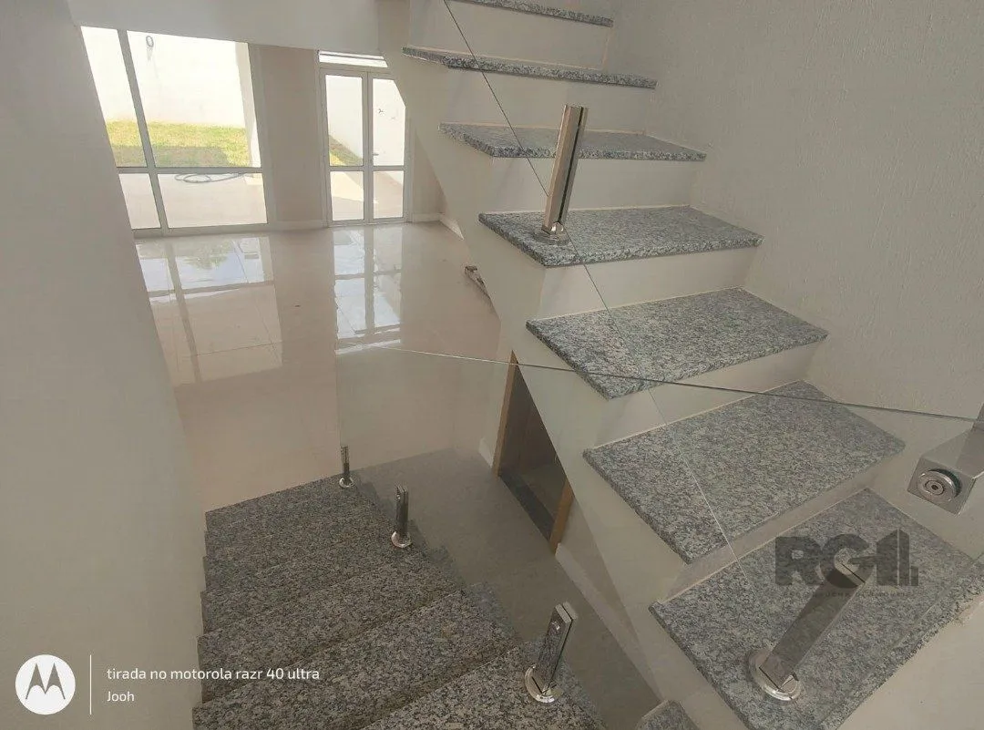 Imagem Casa em Condomínio fechado com 3 dormitórios no bairro Vila Nova em Porto Alegre, RS