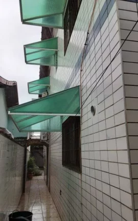 Imagem Sobrado com 4 dormitórios à venda, 216 m² por R$ 750.000,00 - Caiçara - Praia Grande/SP