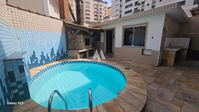 Imagem Casa com 4 dormitórios + 1 suíte + edícula em Ponta da Praia, Santos/SP