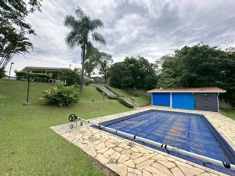 Imagem Belíssima Casa no Condomínio Porta do Sol com piscina e casa de hóspedes