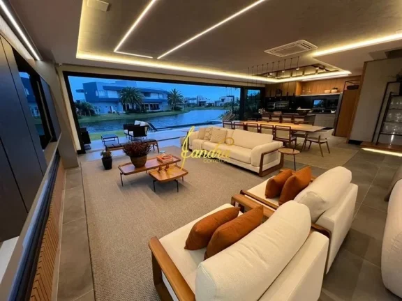 Imagem Casa condomínio com 05 suites e piscina beira de lago