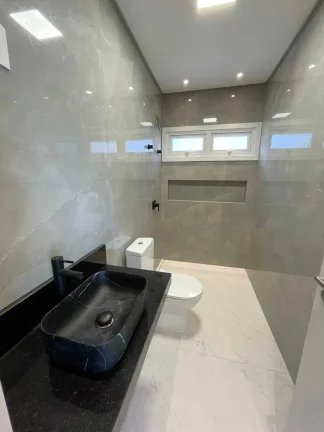 Imagem Casa alto padrão 3 dormitórios sendo 1 suíte e 2 vagas de garagem em Palhoça/SC