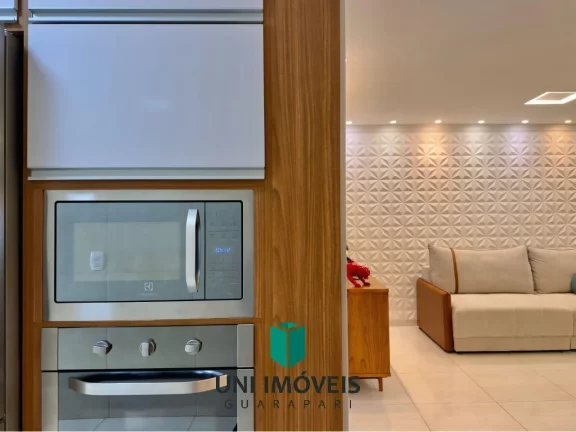 Imagem Triplex à venda em bairro nobre de Guarapari com área gourmet e deck para lagoa