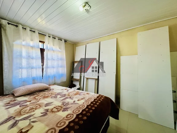Imagem Terreno à venda com 02 casas no Bairro Thomaz Coelho em Araucária/PR.