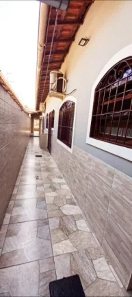 Imagem Casa com 2 dormitórios à venda, 56 m² por R$ 410.000 - Vila Caiçara - Praia Grande/SP