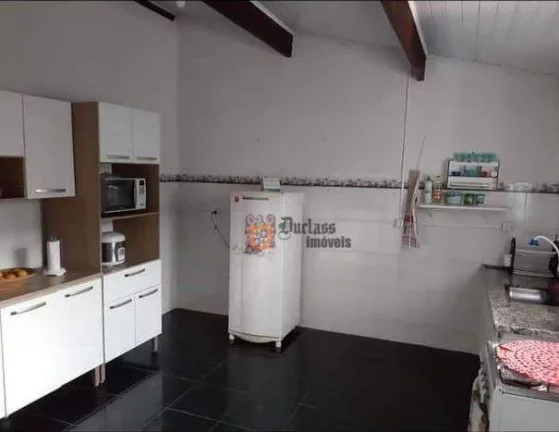 Imagem Sobrado com 4 dormitórios à venda, 230 m² por R$ 380.000 - Getuba - Caraguatatuba/SP