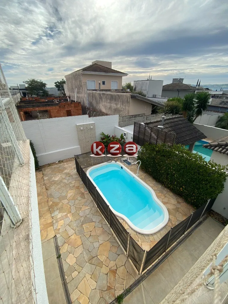 Imagem Lindo imóvel à venda em Valinhos-SP: Casa com 3 quartos, 3 suítes, 2 salas, 5 banheiros, 4 vagas de garagem e 259,29m² de área.