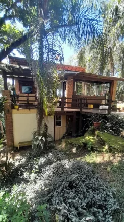 Imagem Casa Rústica em Garopaba-SC: 3 Suítes, Vista Panorâmica, Jacuzzi e 3000m² de Terreno