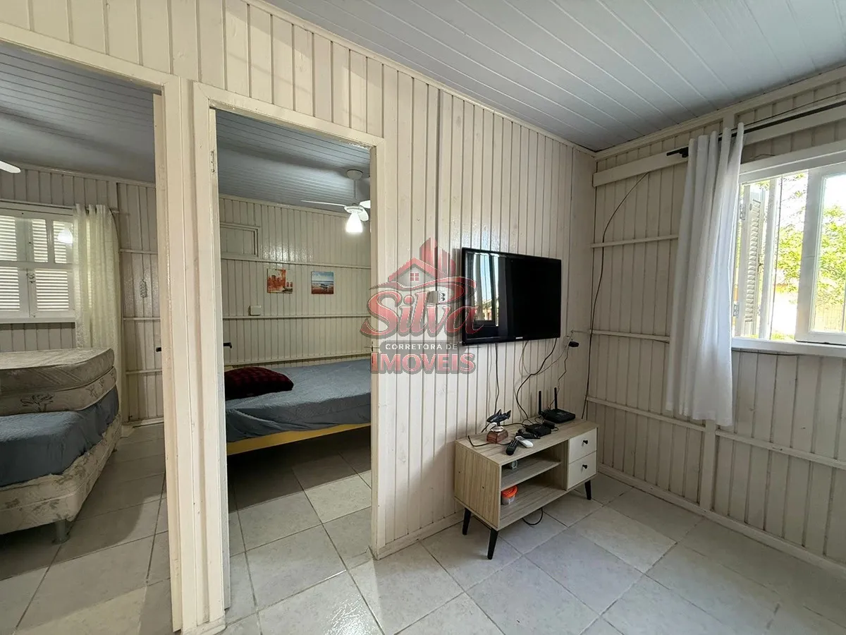 Imagem Casa 3 dormitórios com piscina a 250m do mar