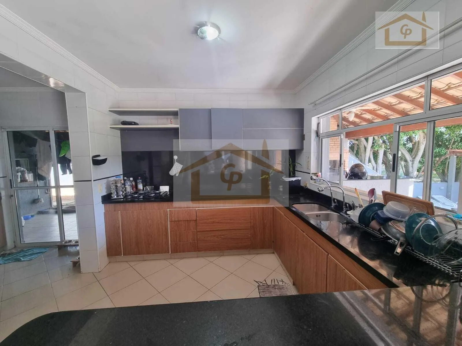 Imagem Casa com 4 dormitórios e piscina em terreno de 940 metros