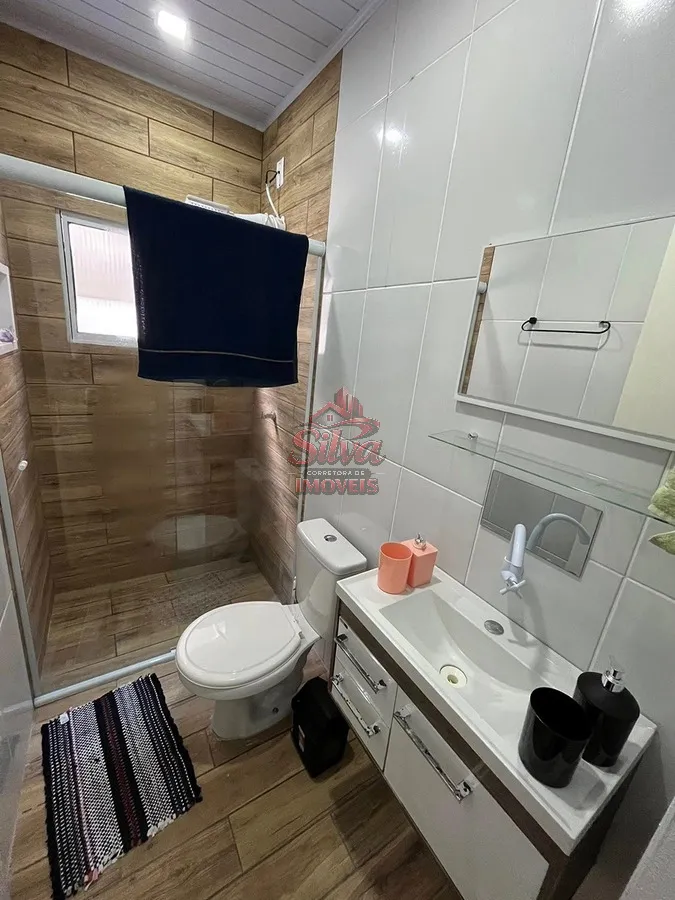 Imagem Casa 2 dormitórios com suíte a 580m do mar no Mariluz