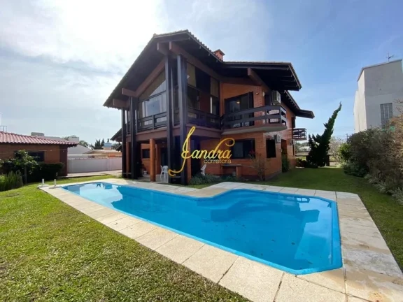 Imagem Sobrado no Centro de Xangri-la com 05 dormitórios com piscina