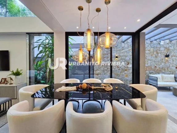 Imagem Casa no Módulo 11 da Riviera com 6 suítes, piscina, jacuzzi e praça de fogo integrada à natureza