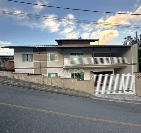 Foto do imóvel Casa Sobrado | Barra do Rio Cerro | 6 quartos (2 suítes) | 248m²