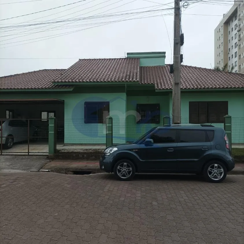 Imagem Casa a venda com 3 dormitorios no centro do Passo de Torres/SC