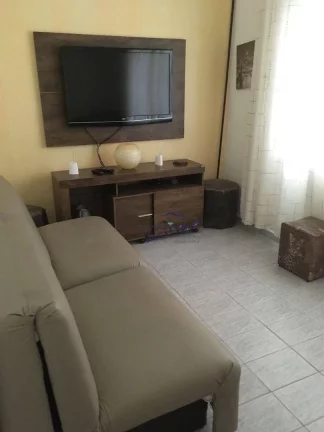 Foto do imóvel Casa com 2 dormitórios à venda, 150 m² por R$ 480.000,00 - Caiçara - Praia Grande/SP