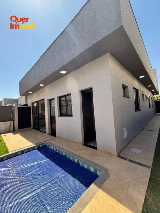 Imagem Casa de alto padrão em condomínio no Jardim Cybelli em Ribeirão Preto-SP! 3 quartos, 3 suítes, 3 salas, 5 banheiros, 4 vagas de garagem e 149,15 m² de área. Quer Imóvel Negócios Imobiliários!