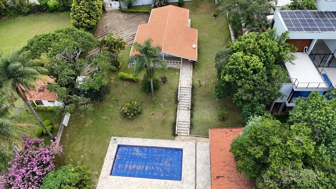Imagem Belíssima Casa no Condomínio Porta do Sol com piscina e casa de hóspedes