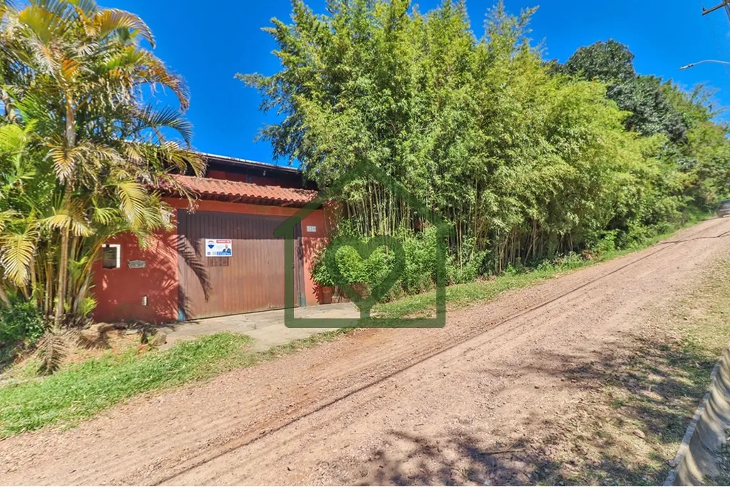 Imagem Casa à venda no bairro Hípica com 165 m2 de área privativa em terreno de 492 m2. O imóvel conta ...