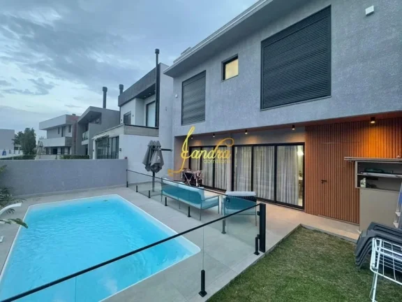 Imagem Sobrado no Sunset com 04 suítes, piscina e placa solar