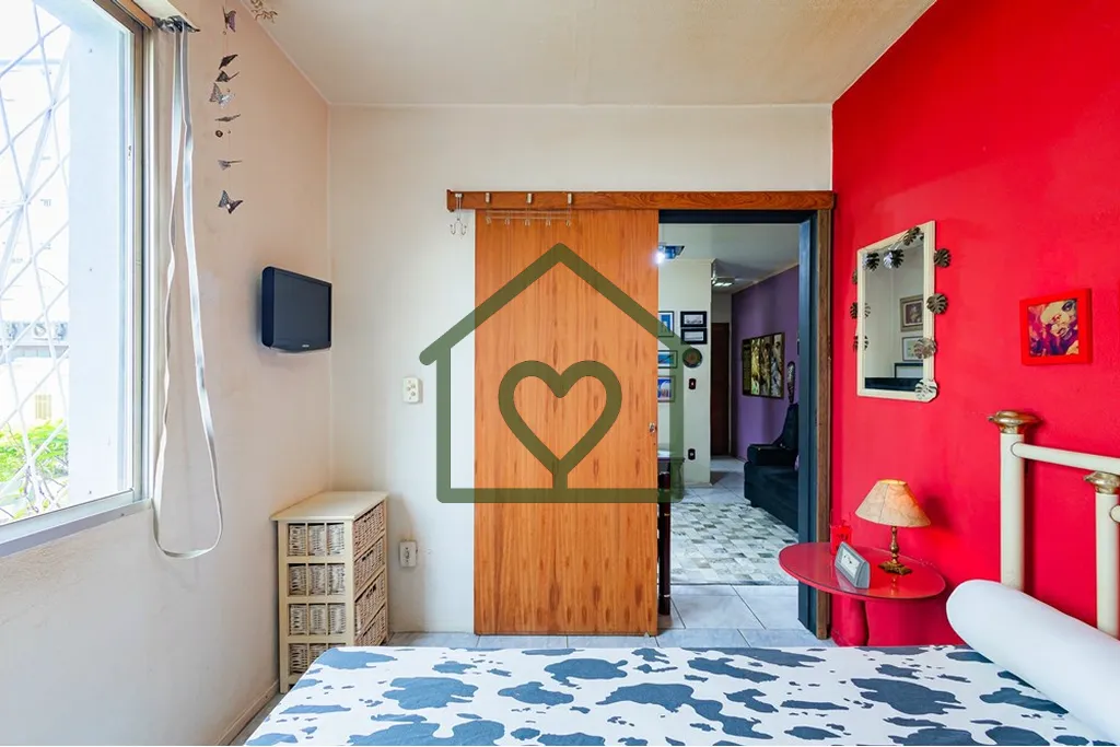 Imagem Descubra o seu novo lar no coração de Porto Alegre. Este aconchegante apartamento está localizado...