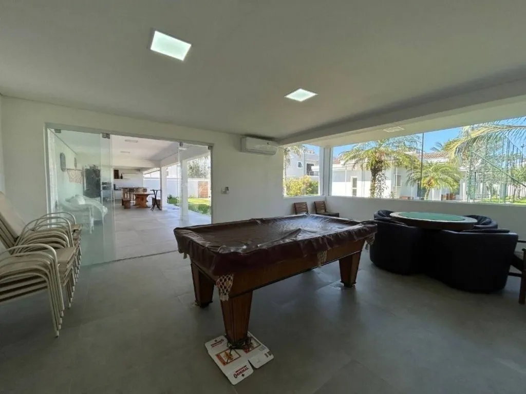 Imagem Alugar casa em condomínio em Jardim Acapulco Guarujá SP, casa á venda em Guarujá SP