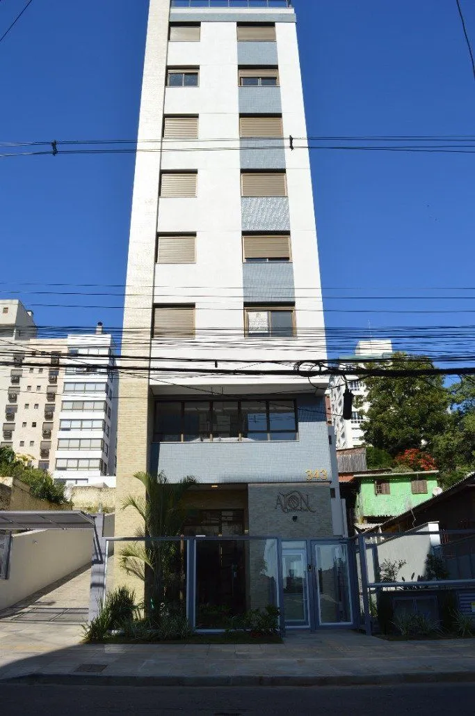 Imagem Lindo apartamento 2 dormitórios com 2 suítes, lavabo, vaga de garagem, amplo living 2 ambientes e cozinha com churrasqueira.