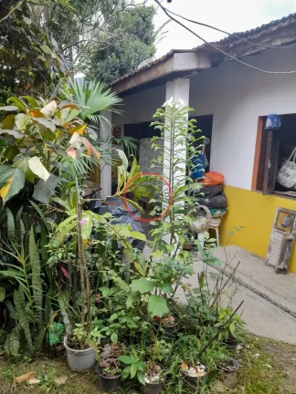 Imagem Casa com 3 quartos , + 1casa de com 2 quartos, terreno de 1020 metros, próximo a praia (200METROS) e de todo comércio local