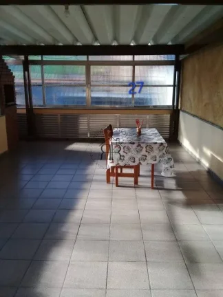 Imagem Sobrado com dois dormitórios sendo um suíte, área gourmet, sala e cozinha grandes, móveis planej...