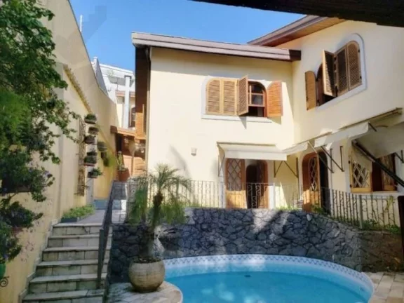 Imagem MAGNÍFICA RESIDÊNCIA * 5 SUÍTES * 5 GARAGENS * RUA TRANQUILA * SUPER SEGURA