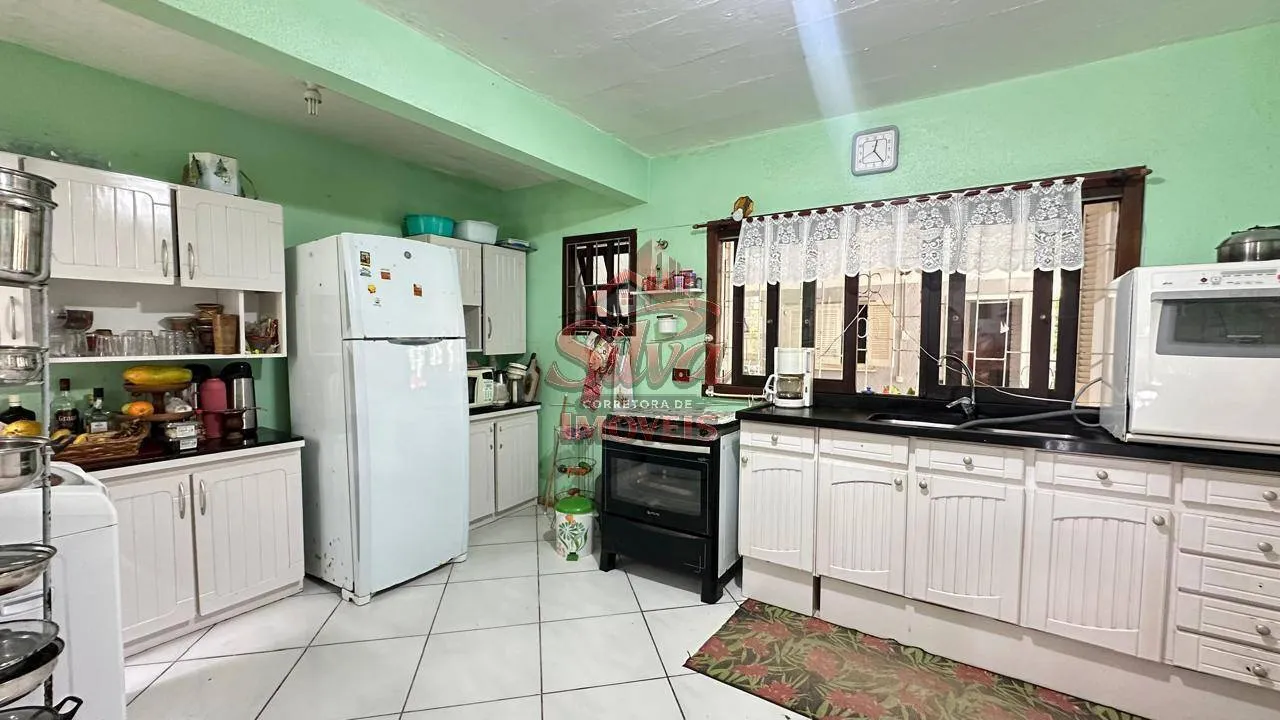 Imagem C33| Casa com piscina próxima do mar à venda em Imbé RS