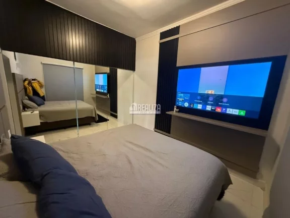 Imagem Casa à venda no Parque das Laranjeiras II em Uberaba - 3 suítes, piscina, varanda gourmet