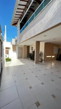 Imagem Sobrado com 3 dormitórios à venda, 84 m² por R$ 468.000,00 - Caiçara - Praia Grande/SP