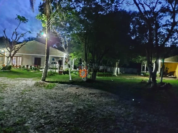 Foto do imóvel Chácara com 5 dormitórios à venda, 7000 m² por R$ 550.000 - Chácaras Lucél - Itanhaém/SP