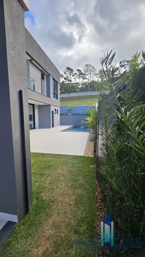 Imagem Casa em Condomínio para Venda em Camboriú, CENTRO, 4 dormitórios, 4 suítes, 5 banheiros, 4 vagas