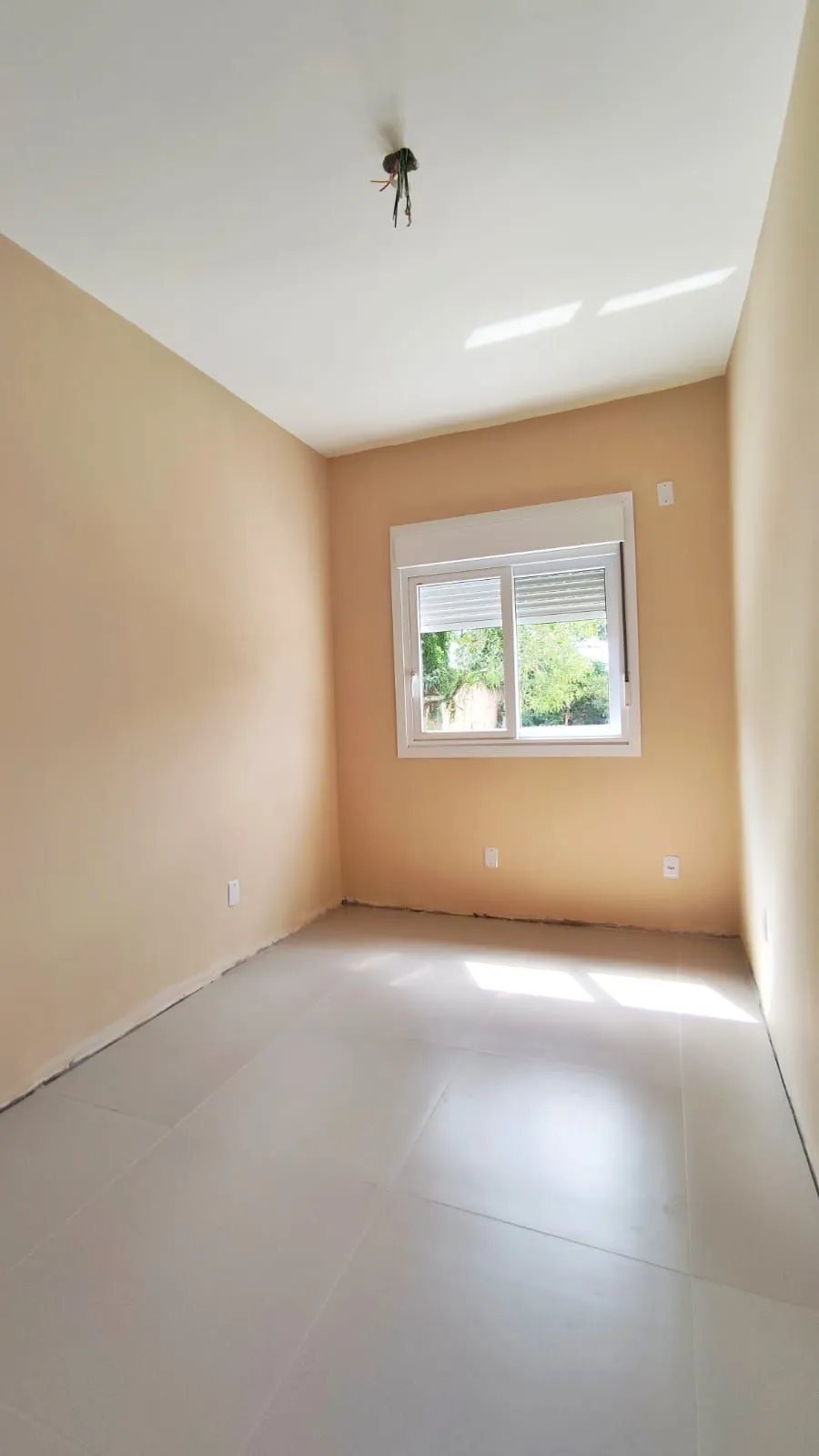 Imagem Sobrado 3 dormitórios com suíte à venda no Vila Ipiranga Porto Alegre R$ 820.000
