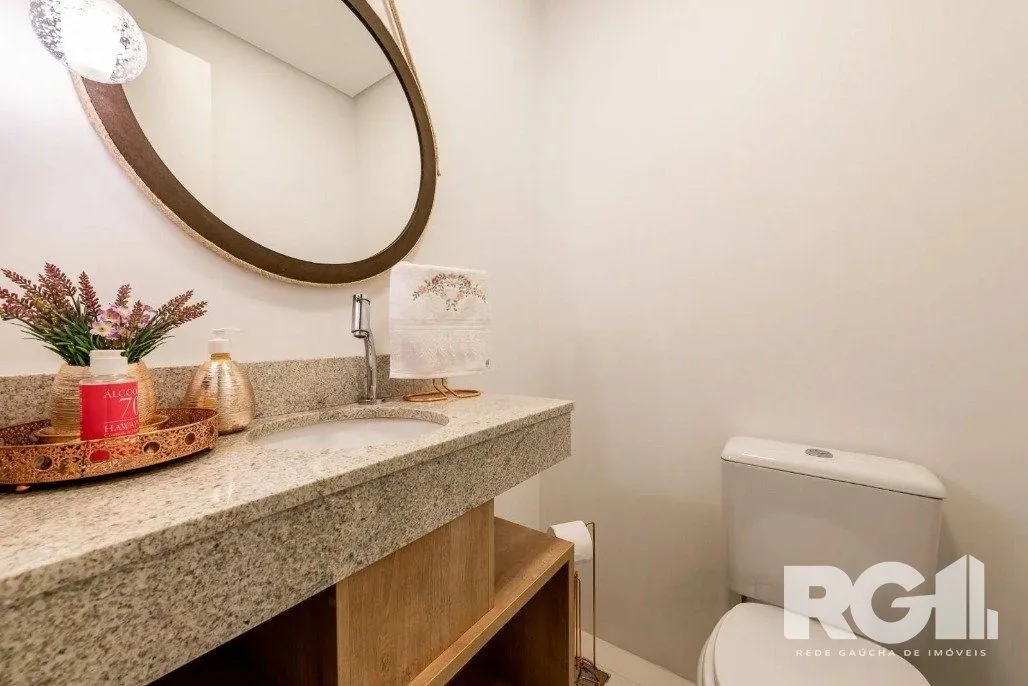Imagem Apartamento de 3 dormitórios com suíte e churrasqueira, lavabo e 2 vagas de garagem.