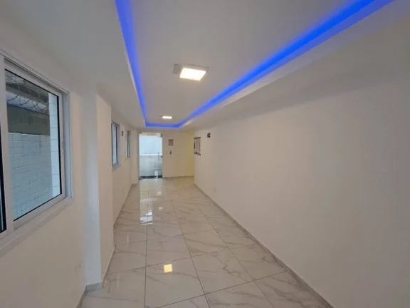 Imagem Apartamento com 2 dormitórios à venda, 56 m² por R$ 320.000 - Caiçara - Praia Grande/SP