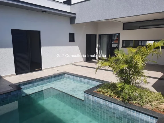 Imagem LINDA CASA COM 3 SUITES ESCRITORIO E PISCINA CONDOMINIO JARDIM LAGUNA INDAIATUBA-SP