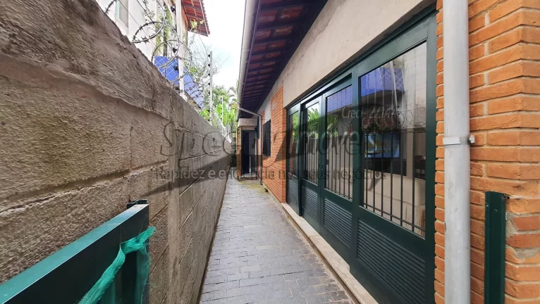 Imagem Sobrado 4 dormitórios no Guarujá, bairro Jardim Vigínia